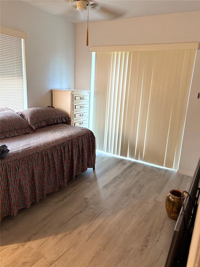 bedroom with light wood-type flooring