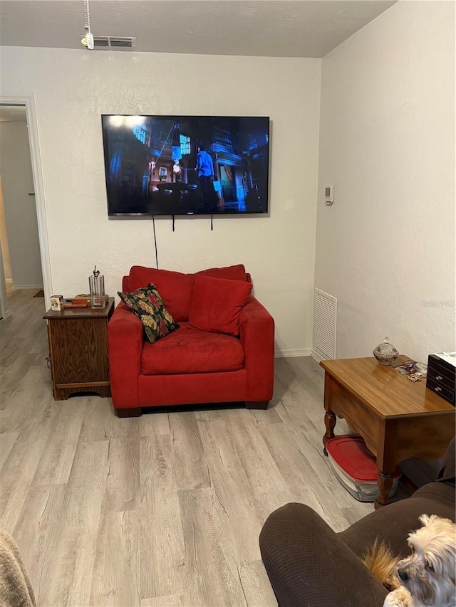 living room featuring light hardwood / wood-style flooring