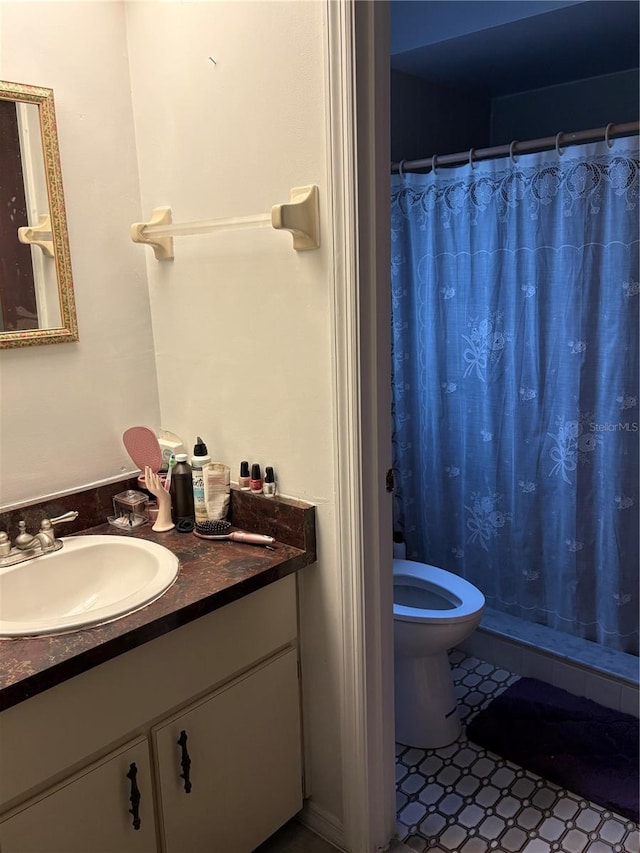 bathroom with vanity and curtained shower