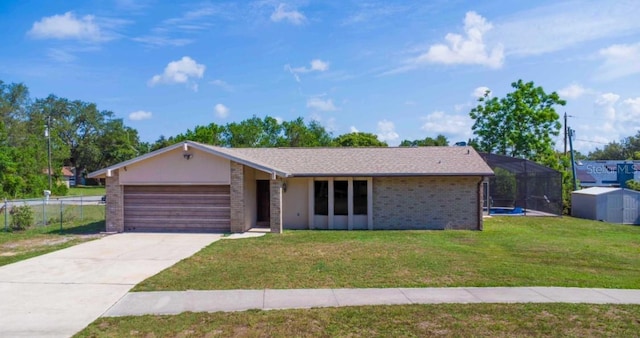 1420 Felton St, Deltona, FL 32725 - ranch-style house featuring an attached garage, brick siding, and driveway