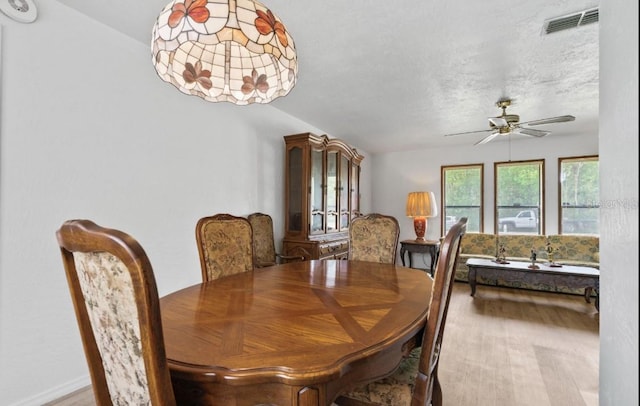 1420 Felton St, Deltona, FL 32725 - dining space with a ceiling fan and wood finished floors