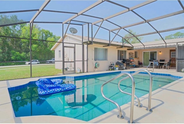 1420 Felton St, Deltona, FL 32725 - outdoor pool featuring a patio area, a lanai, and a lawn
