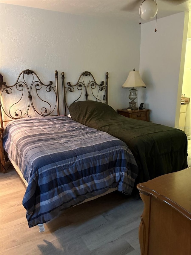 1420 Felton St, Deltona, FL 32725 - bedroom featuring wood finished floors
