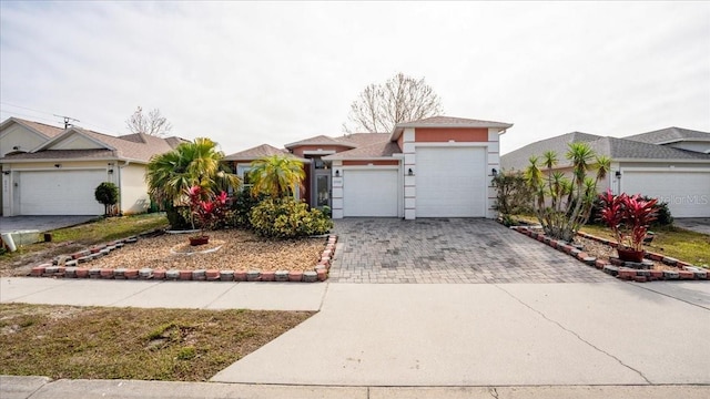 view of front of property with a garage