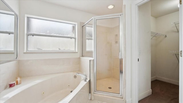 bathroom with independent shower and bath