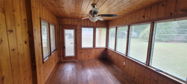 unfurnished sunroom featuring ceiling fan and wood ceiling