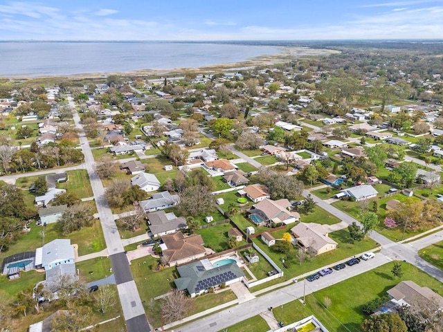 445 Virginia Ave, Saint Cloud, FL 34769 - aerial view of property and surrounding area featuring a large body of water and nearby suburban area
