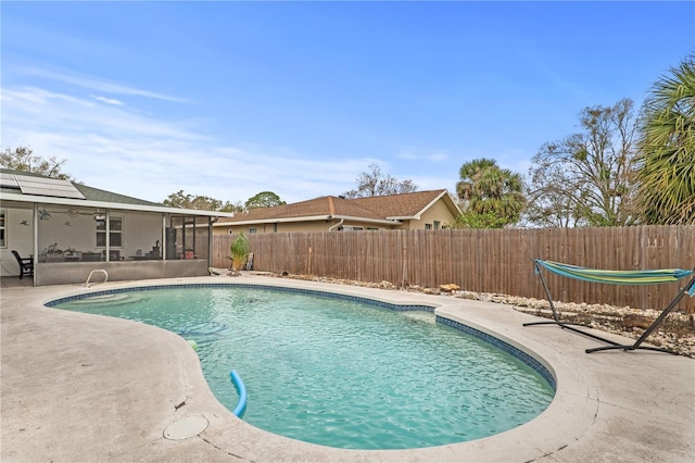 445 Virginia Ave, Saint Cloud, FL 34769 - view of pool with a fenced backyard, a patio, a sunroom, and ceiling fan