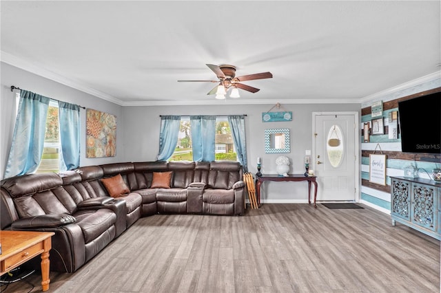 445 Virginia Ave, Saint Cloud, FL 34769 - living area with ceiling fan, ornamental molding, and wood finished floors