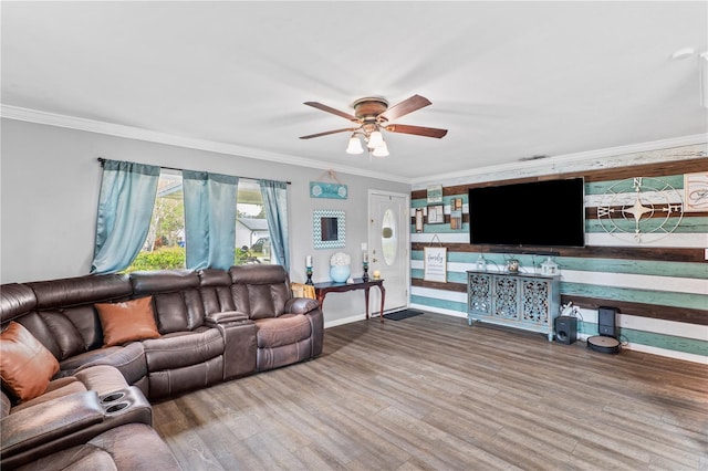 445 Virginia Ave, Saint Cloud, FL 34769 - living room featuring a ceiling fan, wood finished floors, baseboards, and ornamental molding