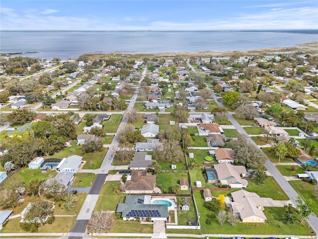 445 Virginia Ave, Saint Cloud, FL 34769 - aerial overview of property's location featuring nearby suburban area and a large body of water