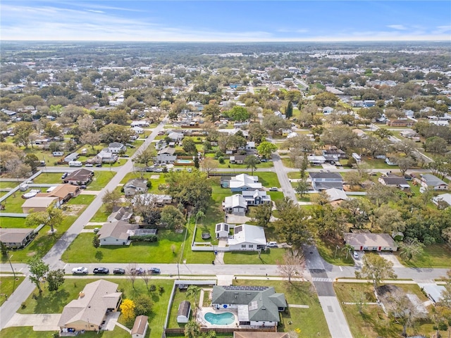 445 Virginia Ave, Saint Cloud, FL 34769 - aerial overview of property's location with nearby suburban area and a pool