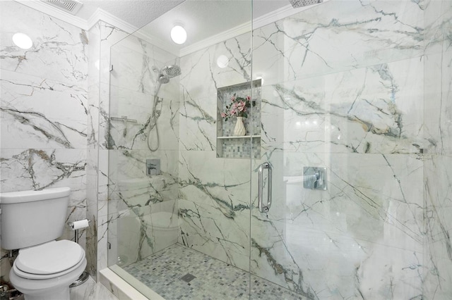 full bath featuring a marble finish shower, visible vents, toilet, ornamental molding, and a textured ceiling