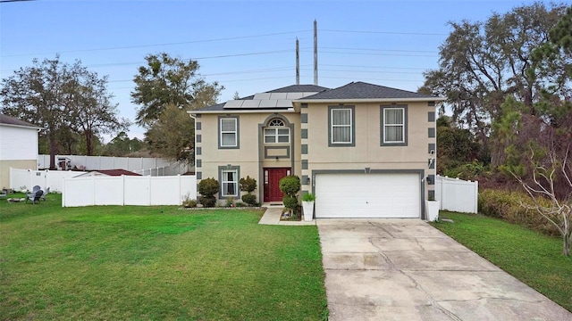 view of front of property with fence, a front lawn, and solar panels