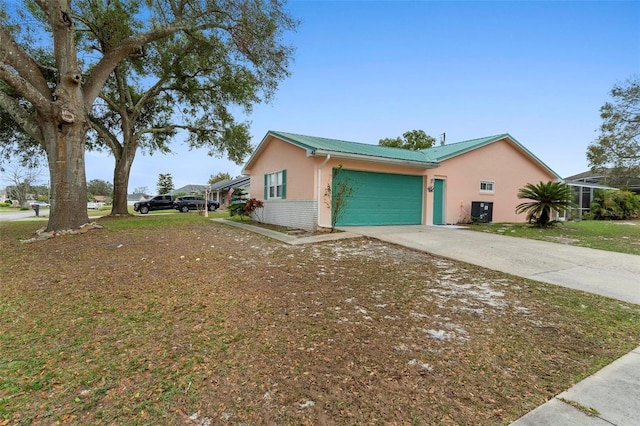 view of property exterior featuring stucco siding, central AC unit, metal roof, a garage, and driveway