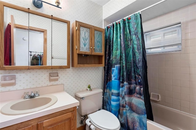 bathroom with toilet, wallpapered walls, shower / bath combo, and vanity