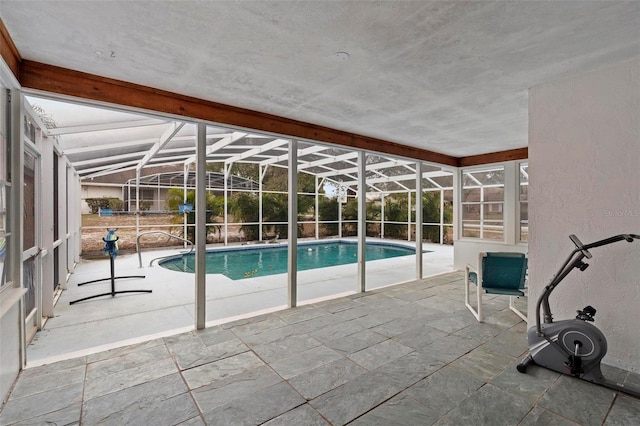 pool featuring a patio area and a lanai