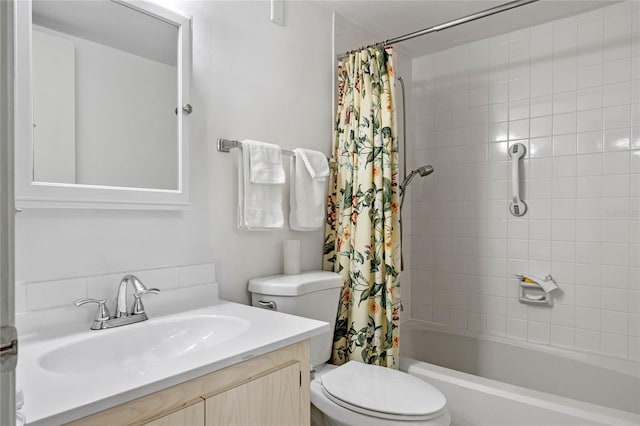 bathroom with toilet, shower / tub combo with curtain, and vanity