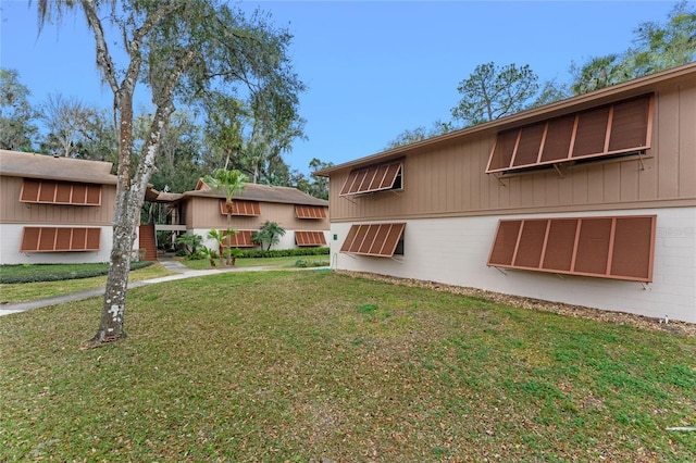 exterior space with a front yard