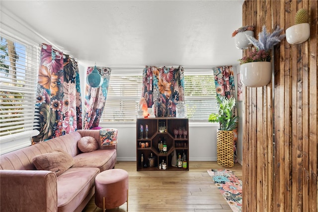 sitting room with light wood-style floors and baseboards