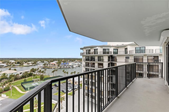 balcony featuring a water view