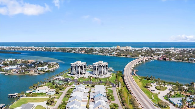 aerial view featuring a water view and a city view