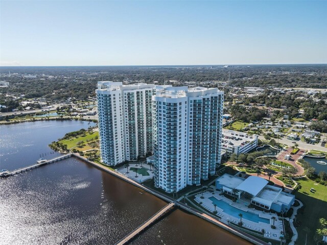 birds eye view of property featuring a water view and a view of city