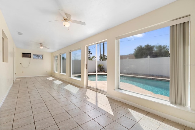 view of swimming pool featuring ceiling fan