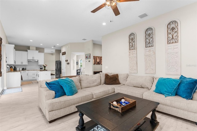 32924 Estate Garden Dr, Wesley Chapel, FL 33545 - living area with light wood-style flooring, visible vents, ceiling fan, and recessed lighting