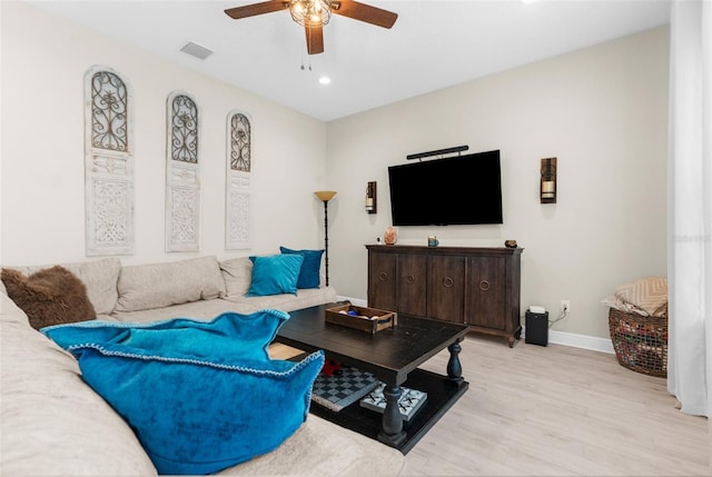 32924 Estate Garden Dr, Wesley Chapel, FL 33545 - living room with light wood finished floors, recessed lighting, visible vents, a ceiling fan, and baseboards
