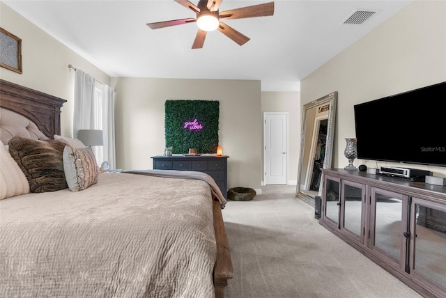 32924 Estate Garden Dr, Wesley Chapel, FL 33545 - bedroom with light carpet, ceiling fan, and visible vents