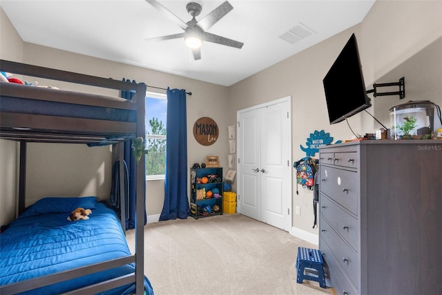 32924 Estate Garden Dr, Wesley Chapel, FL 33545 - bedroom with light carpet, ceiling fan, visible vents, and baseboards