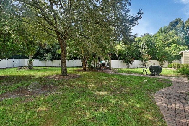 view of yard featuring a fenced backyard