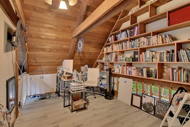 interior space featuring vaulted ceiling, wooden ceiling, and wood finished floors