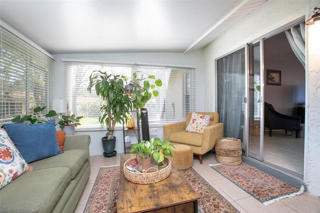 sunroom featuring vaulted ceiling