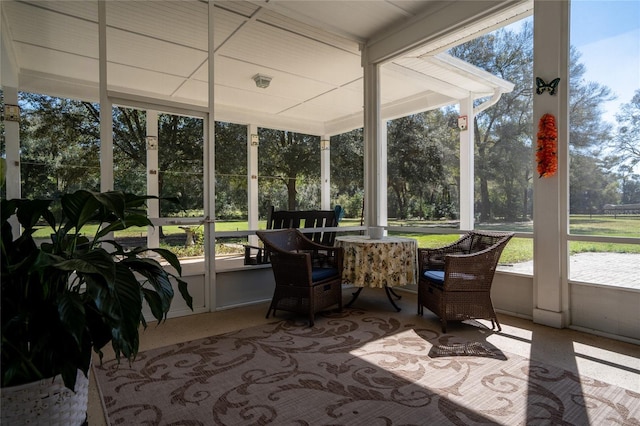 sunroom / solarium featuring a wealth of natural light