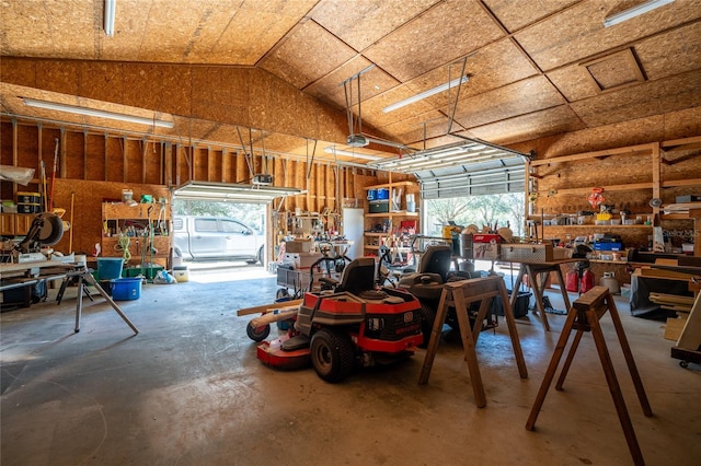 garage with a workshop area