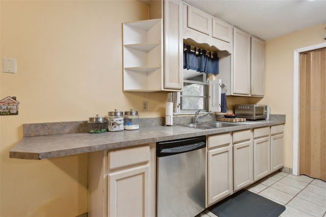 kitchen featuring light tile patterned floors, a toaster, dishwasher, open shelves, and a sink