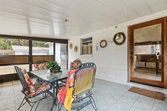 sunroom with wooden ceiling