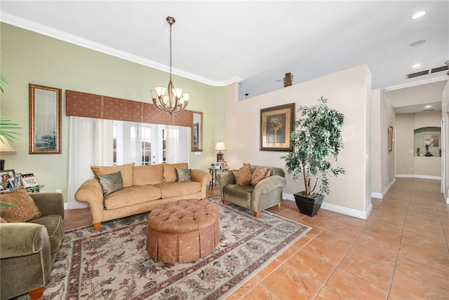 living area with visible vents, baseboards, an inviting chandelier, crown molding, and light tile patterned flooring