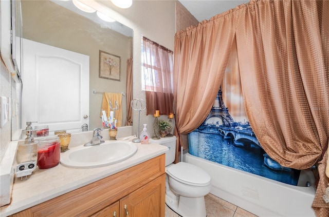 bathroom featuring toilet, tile patterned flooring, shower / bath combo with shower curtain, and vanity