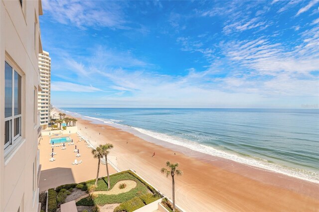 view of water feature with a beach view