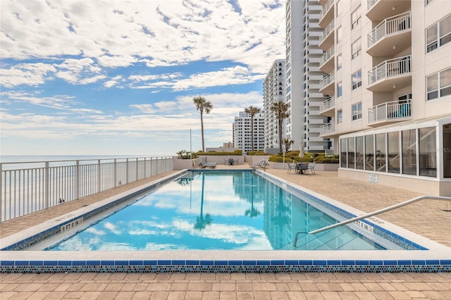 community pool with a water view