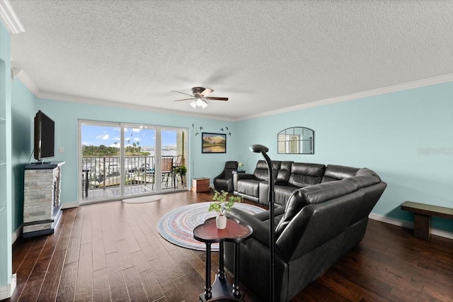 living room featuring dark wood-type flooring and ornamental molding