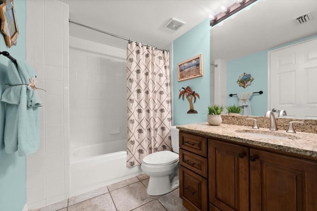 full bath with toilet, vanity, visible vents, and tile patterned floors