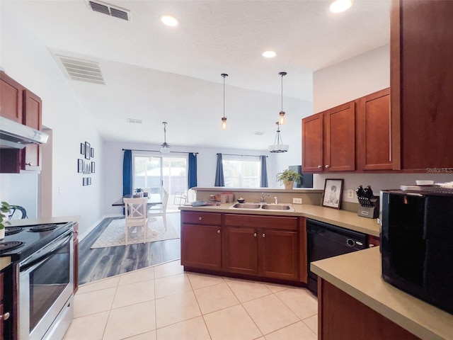 kitchen with electric range, visible vents, light countertops, hanging light fixtures, and dishwasher