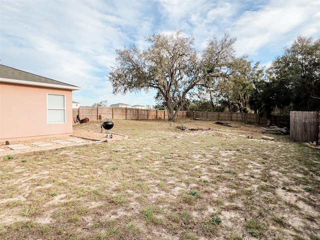 view of yard featuring a fenced backyard