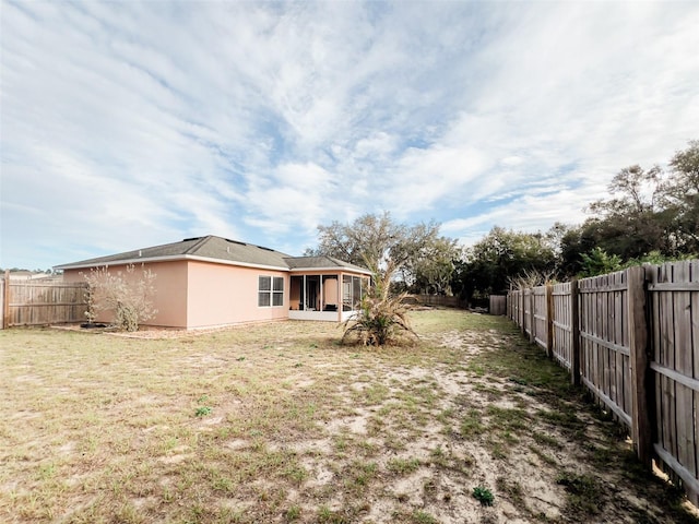 view of yard featuring a fenced backyard