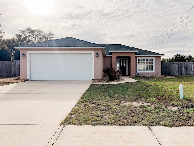 ranch-style home with stucco siding, concrete driveway, a front yard, fence, and a garage