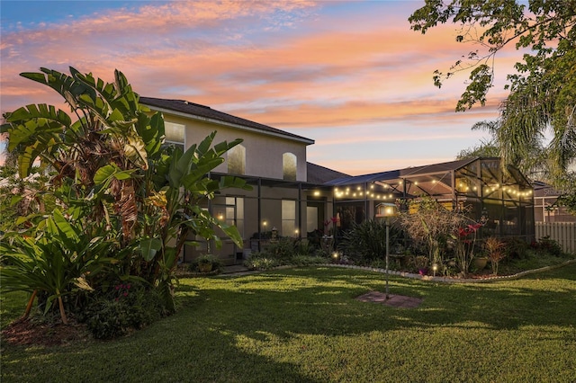 yard at dusk with a lanai